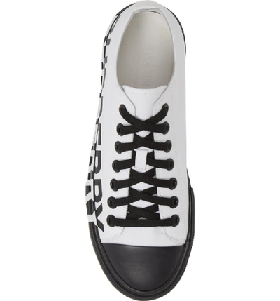 Shop Burberry Larkhall Graphic Logo Sneaker In Optic White / Black