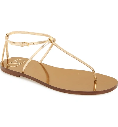 Shop Valentino Rockstud T-strap Sandal In Dark Gold