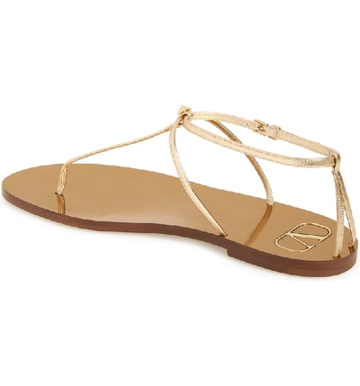 Shop Valentino Rockstud T-strap Sandal In Dark Gold