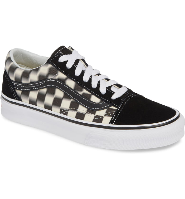 blurred checkerboard vans