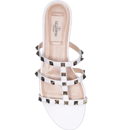 Shop Valentino Rockstud Slide Sandal In Optic White