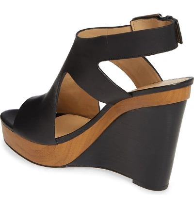 Shop Michael Michael Kors Josephine Wedge Sandal In Black Vachetta Leather