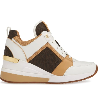 Shop Michael Michael Kors Georgie Wedge Sneaker In Butternut Leather