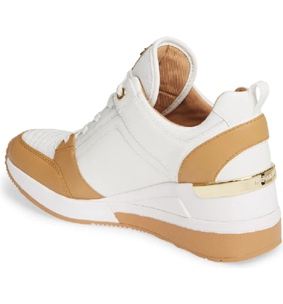 Shop Michael Michael Kors Georgie Wedge Sneaker In Optic White Multi