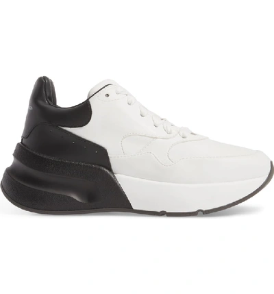 Shop Alexander Mcqueen Oversized Lace-up Sneaker In White/ Black