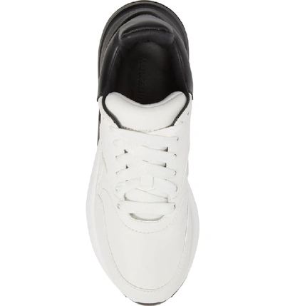 Shop Alexander Mcqueen Oversized Lace-up Sneaker In White/ Black