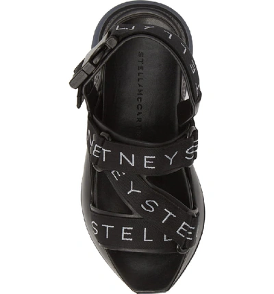 Shop Stella Mccartney Strappy Logo Platform Sandal In Black