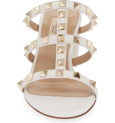 Shop Valentino Rockstud Slide Sandal In Optic White