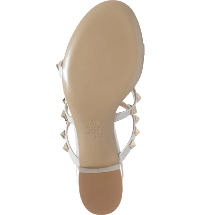 Shop Valentino Rockstud Slide Sandal In Optic White