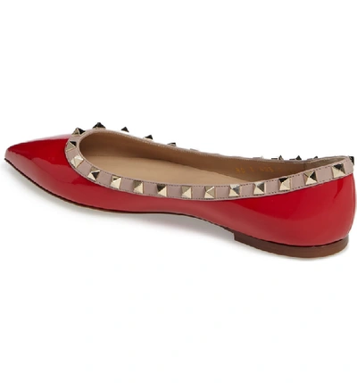 Shop Valentino Rockstud Ballerina Flat In Rosso