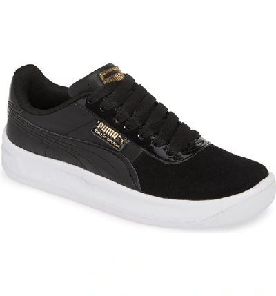 Shop Puma California Sneaker In Black/ Team Gold