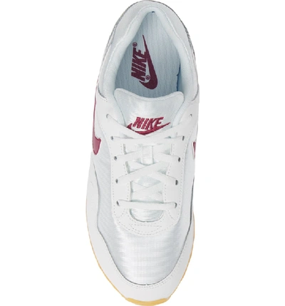 Shop Nike Outburst Sneaker In White/ True Berry/ Gum Yellow