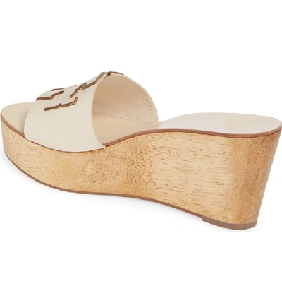 Shop Tory Burch Ines Wedge Slide Sandal In New Cream / Gold