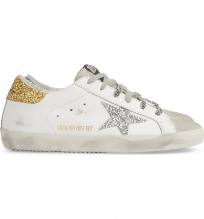 Shop Golden Goose Superstar Low Top Sneaker In White/ Gold/ Silver