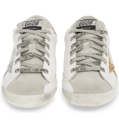 Shop Golden Goose Superstar Low Top Sneaker In White/ Gold/ Silver