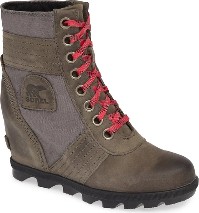 Shop Sorel Lexie Wedge Waterproof Boot In Quarry