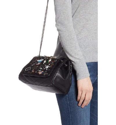 Shop Saint Laurent Small Nolita Pin Embellished Leather Shoulder Bag - Black In Noir