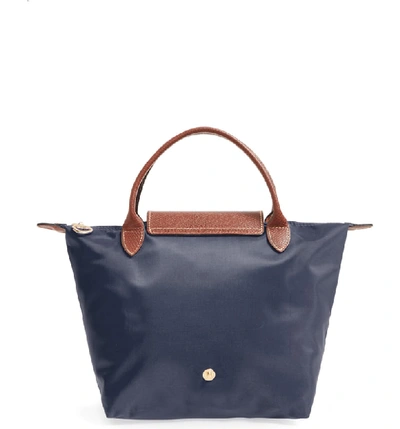 Shop Longchamp Small Le Pliage Top Handle Tote - Blue In New Navy