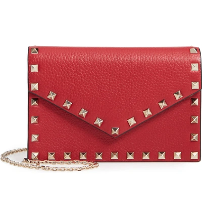 Shop Valentino Rockstud Calfskin Leather Envelope Pouch - Red In Rosso V