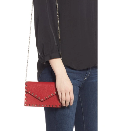 Shop Valentino Rockstud Calfskin Leather Envelope Pouch - Red In Rosso V