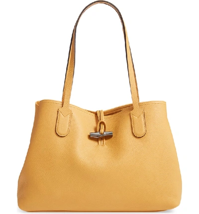 Shop Longchamp Roseau Essential Mid Leather Tote In Honey