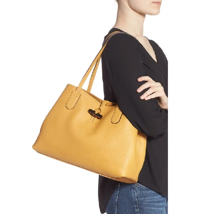 Shop Longchamp Roseau Essential Mid Leather Tote In Honey