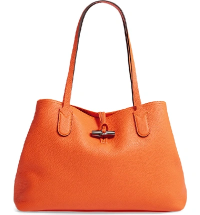 Shop Longchamp Roseau Essential Mid Leather Tote In Orange