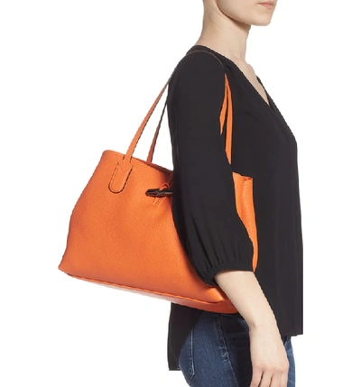 Shop Longchamp Roseau Essential Mid Leather Tote In Orange