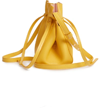 Shop Mansur Gavriel Mini Lambskin Leather Drawstring Bag - Yellow In Sun/ Rosa