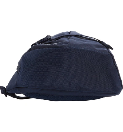 Shop Patagonia Atom 8l Sling Backpack In Classic Navy W/ Navy