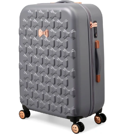 Shop Ted Baker Medium Beau Bow Embossed Four-wheel 27-inch Trolley Suitcase - Grey