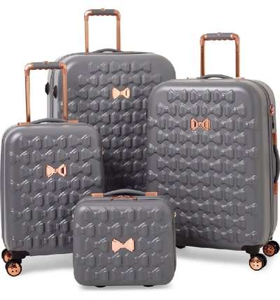 Shop Ted Baker Medium Beau Bow Embossed Four-wheel 27-inch Trolley Suitcase - Grey