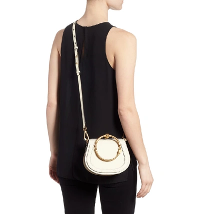 Shop Chloé Small Nile Bracelet Leather Crossbody Bag In Off White