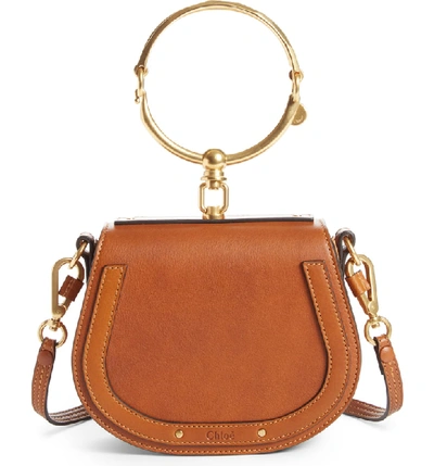 Shop Chloé Small Nile Bracelet Leather Crossbody Bag - Brown In Caramel