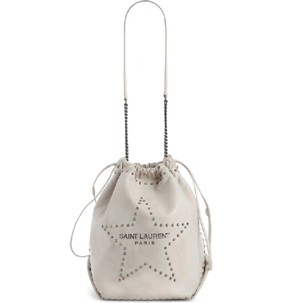 Shop Saint Laurent Teddy Star Studded Leather Bucket Bag - White In Crema Soft