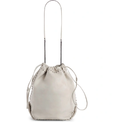 Shop Saint Laurent Teddy Star Studded Leather Bucket Bag - White In Crema Soft