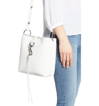 Shop Rebecca Minkoff Small Megan Leather Crossbody Feed Bag - White In Optic White