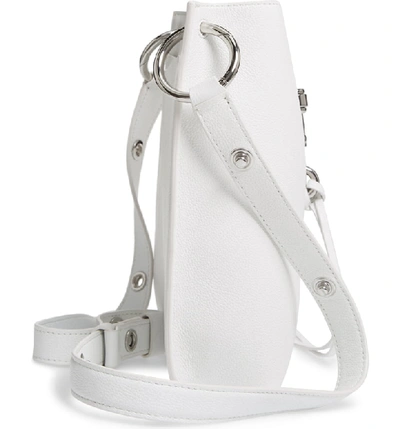 Shop Rebecca Minkoff Small Megan Leather Crossbody Feed Bag - White In Optic White