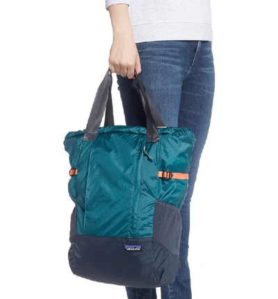 Shop Patagonia Lightweight Travel Tote Pack - Blue In Tasmanian Teal