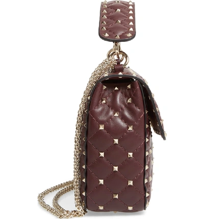Shop Valentino Medium Rockstud Matelassé Quilted Leather Crossbody Bag In Rubin