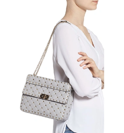 Shop Valentino Medium Rockstud Matelassé Quilted Leather Crossbody Bag In Pastel Grey