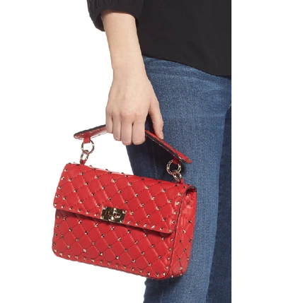 Shop Valentino Medium Rockstud Matelassé Quilted Leather Crossbody Bag In Rouge Pur