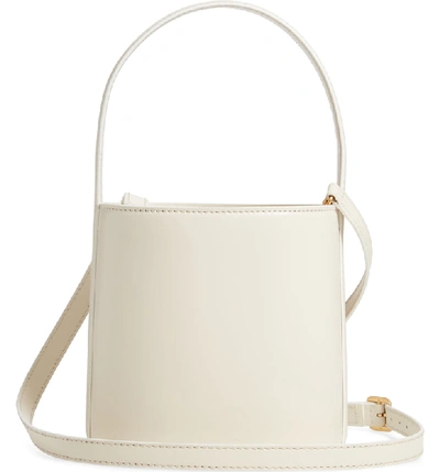 Shop Staud Bissett Leather Bucket Bag In Cream