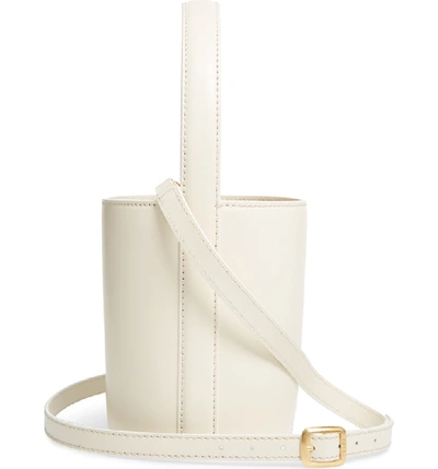 Shop Staud Bissett Leather Bucket Bag In Cream
