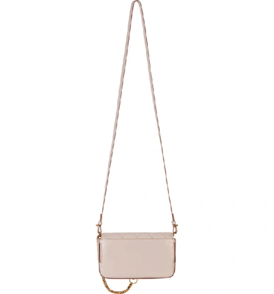 Shop Givenchy Mini Pocket Quilted Convertible Leather Bag - Pink In Pale Pink