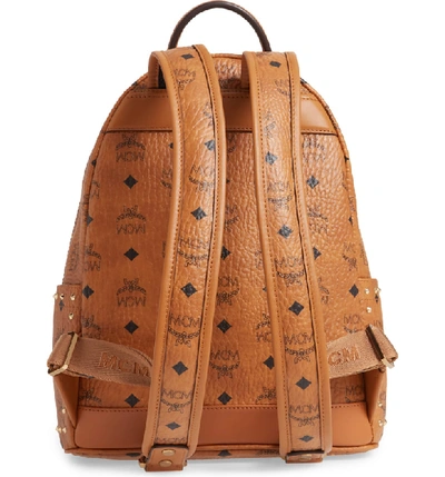 Shop Mcm Small Stark Outline Stud Leather Backpack In Cognac