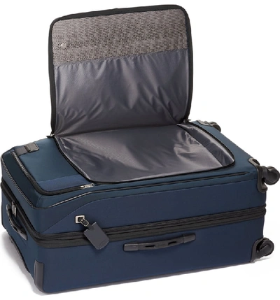 Shop Tumi Merge 31-inch Extended Trip Expandable Rolling Luggage In Navy