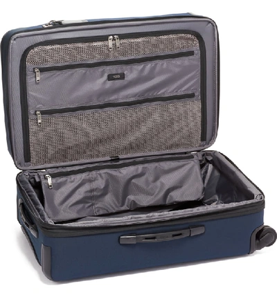 Shop Tumi Merge Short Trip Expandable Rolling Packing Case In Navy