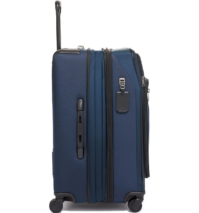 Shop Tumi Merge Short Trip Expandable Rolling Packing Case In Navy