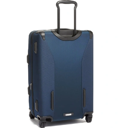 Shop Tumi Merge Short Trip Expandable Rolling Packing Case In Navy